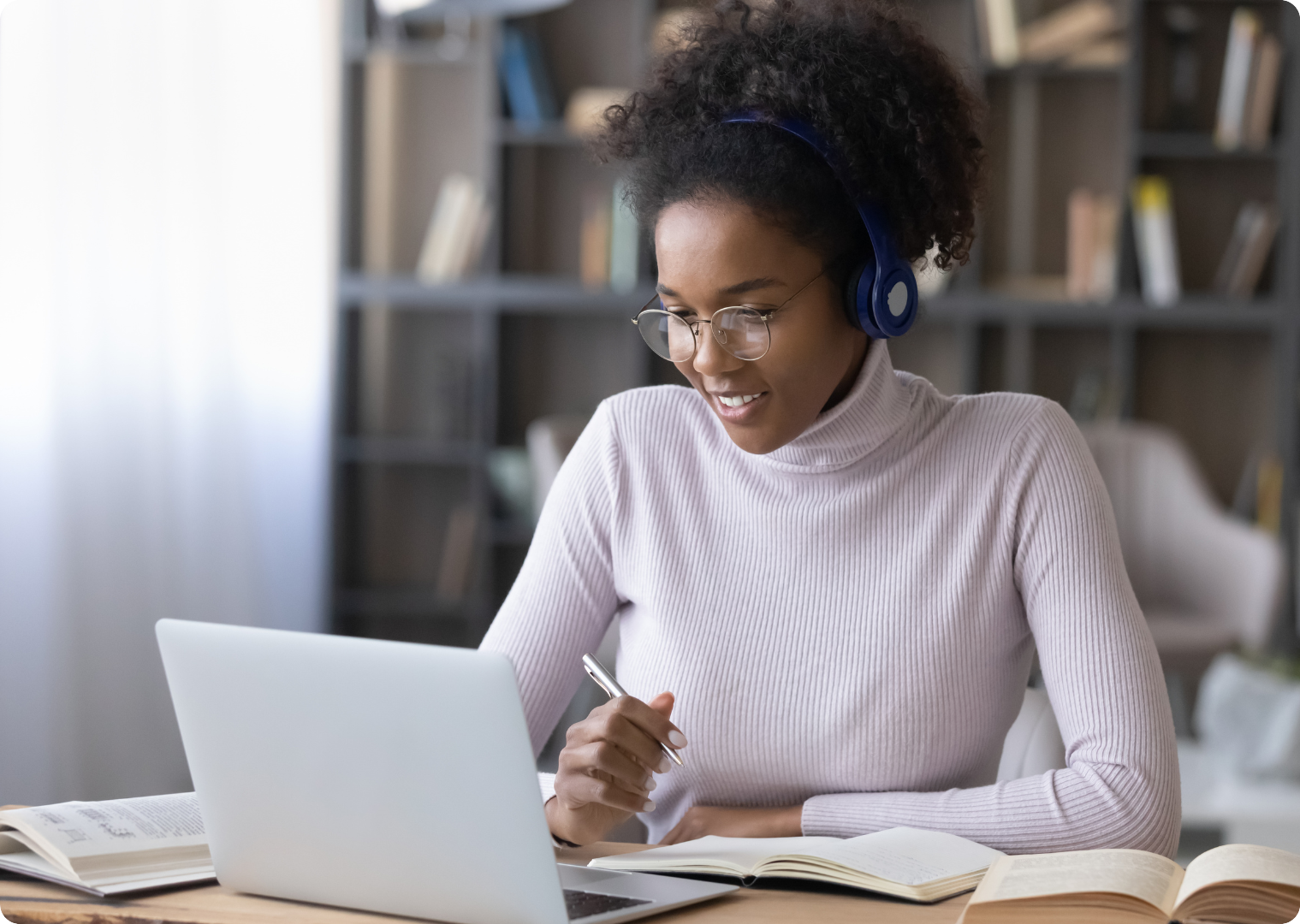 image of woman looking at laptop